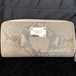 Michael Kors leather snake design wallet with lots of pockets